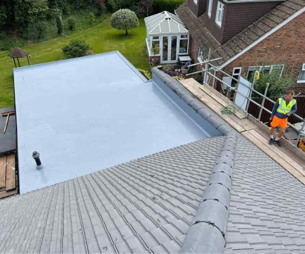 This is a photo of a newly installed hip roof, with a combined liquid covered flat roof. Work carried out by SAR Roofing Biggleswade