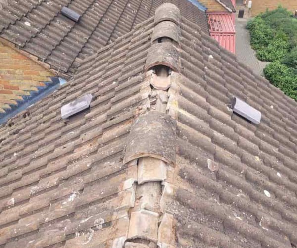 This is a photo if a roof ridge which has missing tiles. The ridge tiles are being replaced by SAR Roofing Biggleswade